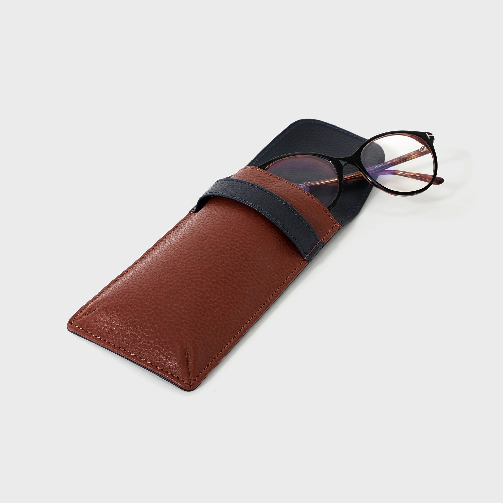 Pebble Grain Leather Fold Over Glasses Case - Navy / Tan
